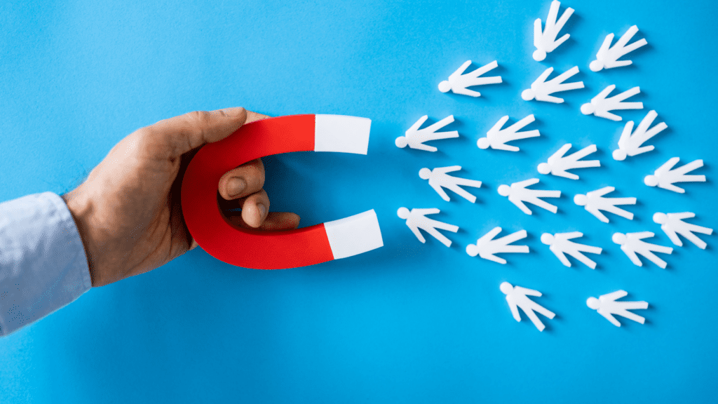Deacon Solutions visual of a magnet attracting people to represent how to attract more online leads through marketing