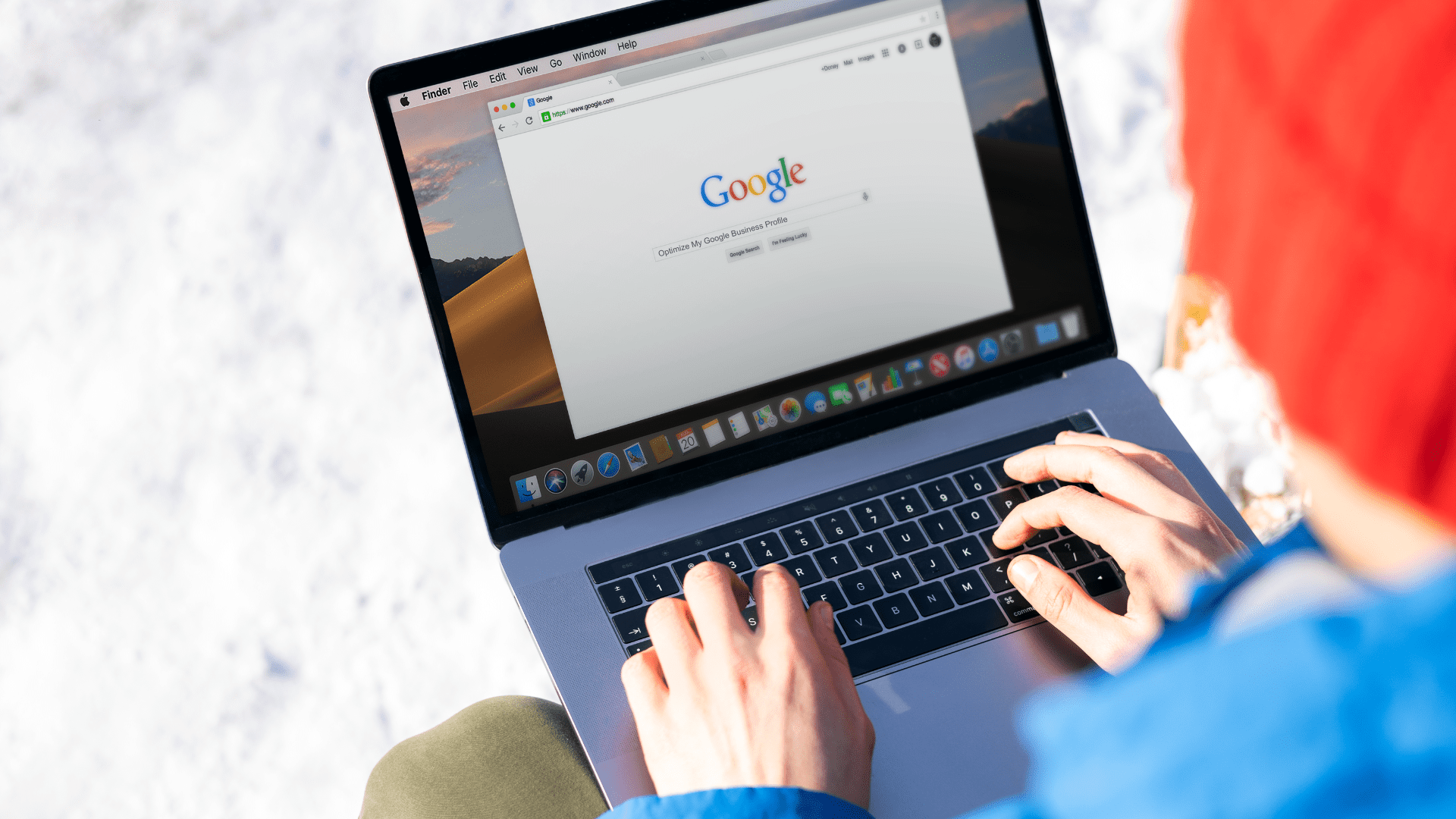 Deacon Solutions Google Business Profile Optimization Guide example of optimizing a business listing on Google using a laptop
